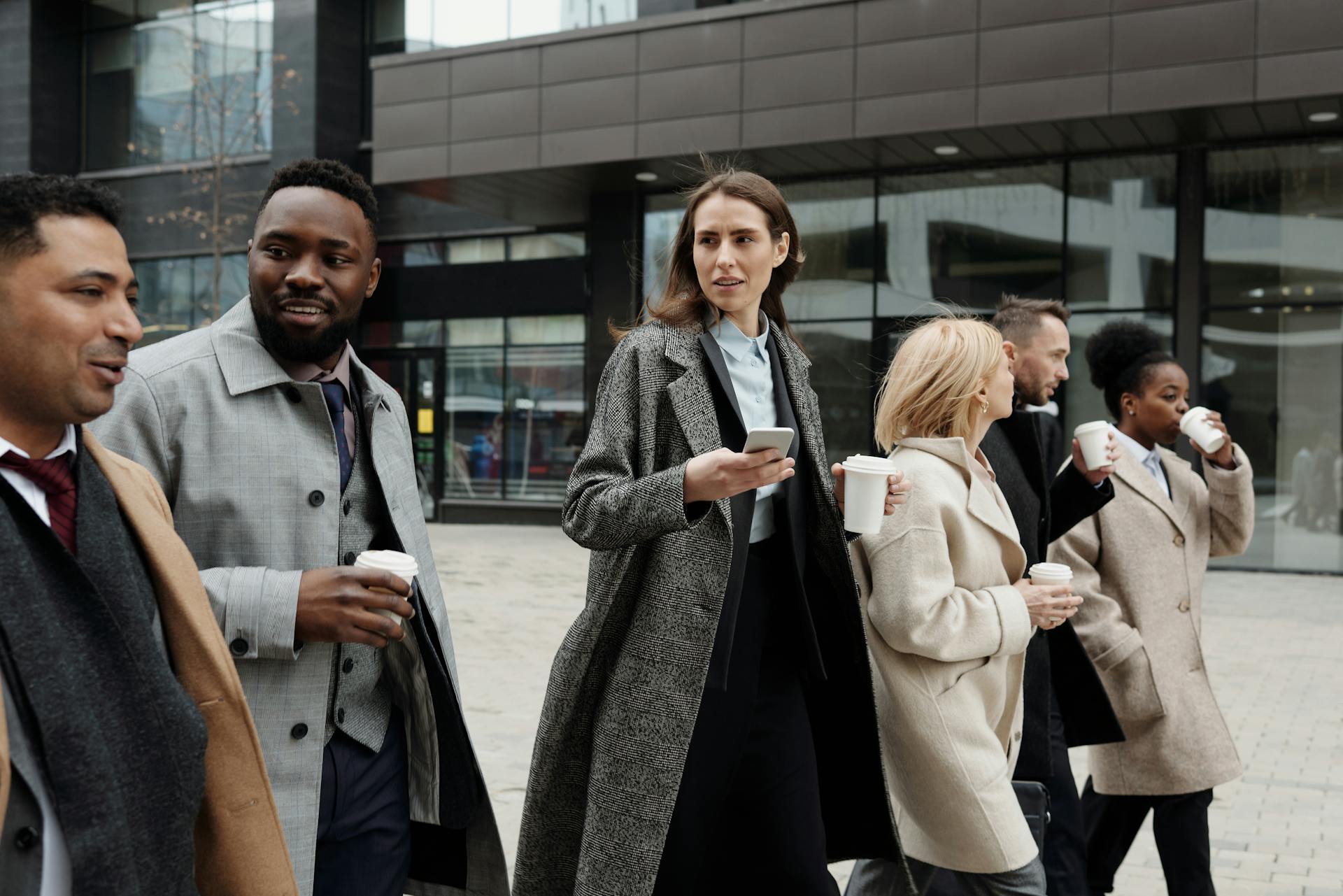 Colleagues walking together and talking