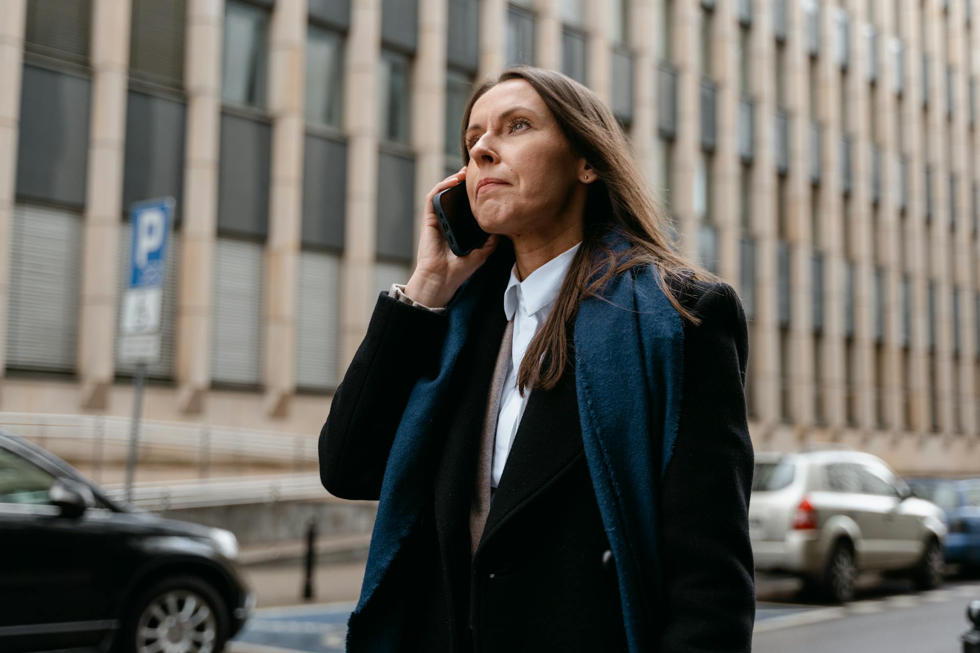 Business woman outside talking on the phone